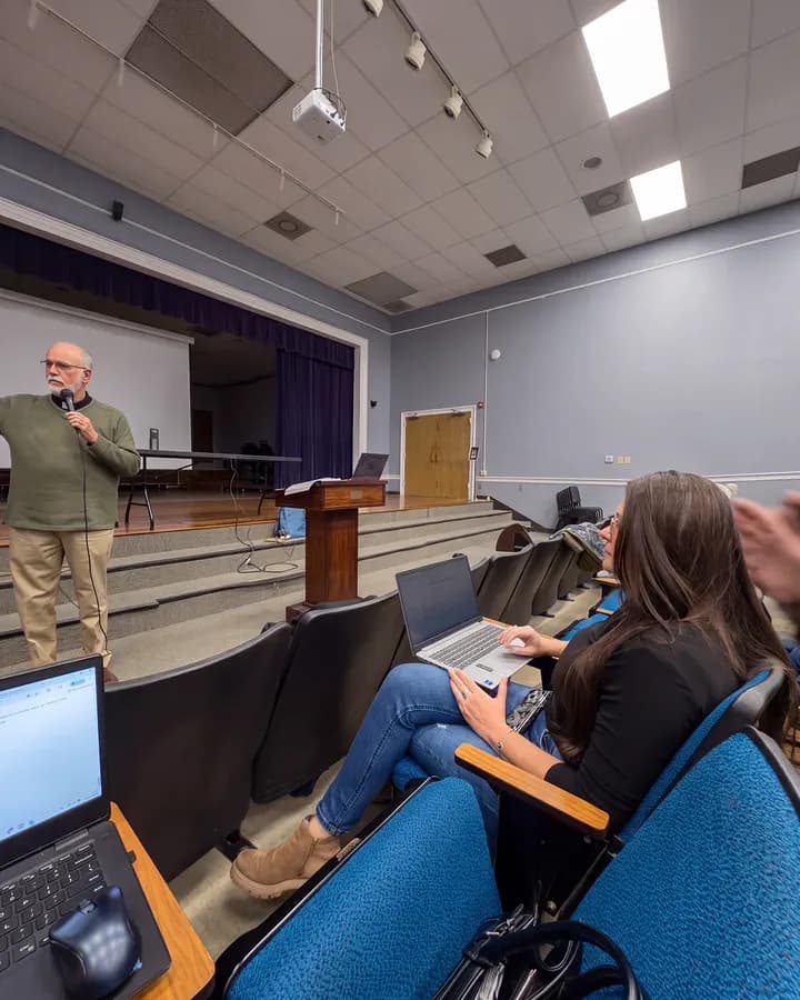 Students in a university lecture auditorium